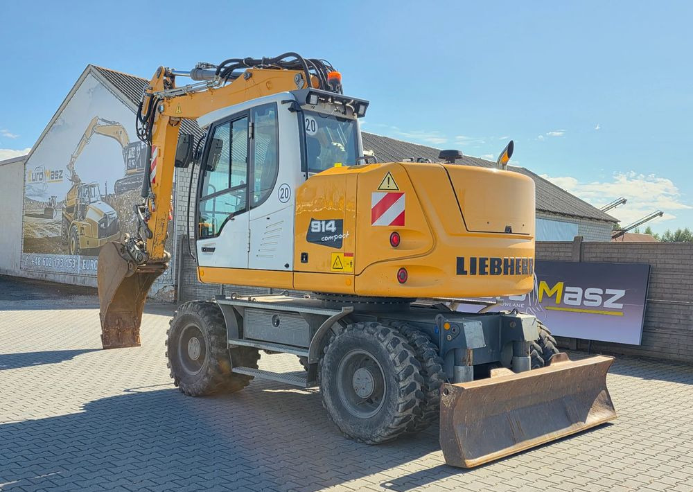 Liebherr A914 COMPACT, 2015 ROK, SW 48 szybkozłącze - Bager na kotačima: slika Liebherr A914 COMPACT, 2015 ROK, SW 48 szybkozłącze - Bager na kotačima Liebherr A914 COMPACT, 2015 ROK, SW 48 szybkozłącze - Bager na kotačima: slika Liebherr A914 COMPACT, 2015 ROK, SW 48 szybkozłącze - Bager na kotačima