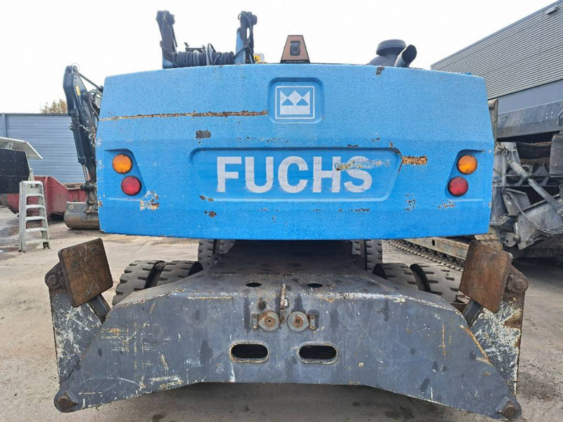 Fuchs MHL 335 - Stroj za rukovanje otpadom: slika Fuchs MHL 335 - Stroj za rukovanje otpadom Fuchs MHL 335 - Stroj za rukovanje otpadom: slika Fuchs MHL 335 - Stroj za rukovanje otpadom