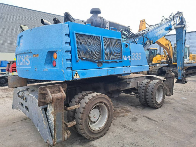 Fuchs MHL 335 - Stroj za rukovanje otpadom: slika Fuchs MHL 335 - Stroj za rukovanje otpadom Fuchs MHL 335 - Stroj za rukovanje otpadom: slika Fuchs MHL 335 - Stroj za rukovanje otpadom