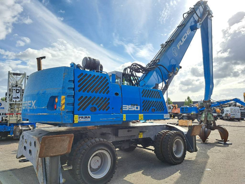 Fuchs MHL 350 E - Stroj za rukovanje otpadom: slika Fuchs MHL 350 E - Stroj za rukovanje otpadom Fuchs MHL 350 E - Stroj za rukovanje otpadom: slika Fuchs MHL 350 E - Stroj za rukovanje otpadom