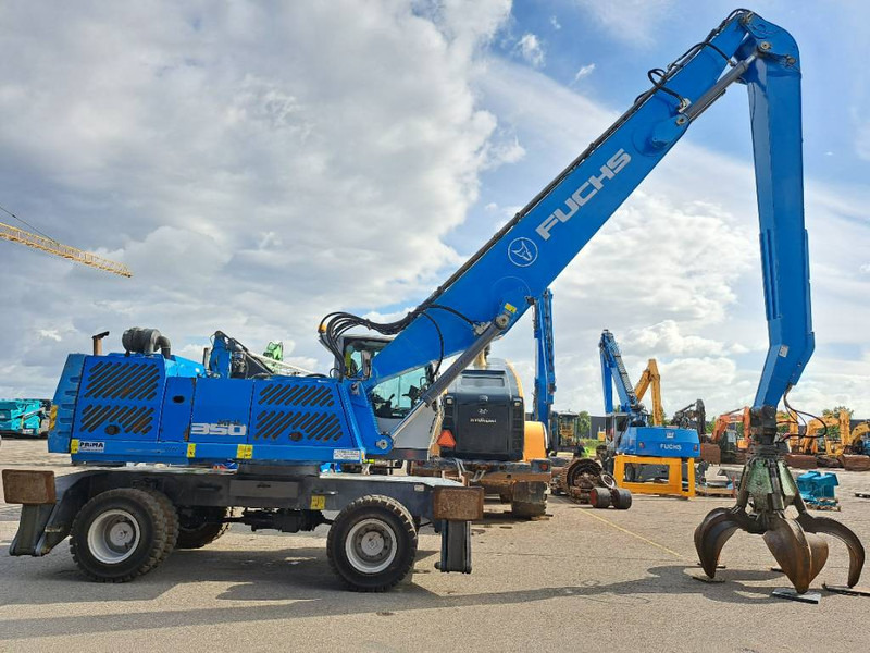 Fuchs MHL 350 E - Stroj za rukovanje otpadom: slika Fuchs MHL 350 E - Stroj za rukovanje otpadom Fuchs MHL 350 E - Stroj za rukovanje otpadom: slika Fuchs MHL 350 E - Stroj za rukovanje otpadom