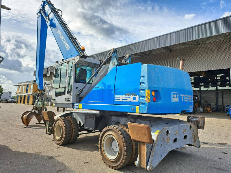 Fuchs MHL 350 E - Stroj za rukovanje otpadom: slika Fuchs MHL 350 E - Stroj za rukovanje otpadom Fuchs MHL 350 E - Stroj za rukovanje otpadom: slika Fuchs MHL 350 E - Stroj za rukovanje otpadom