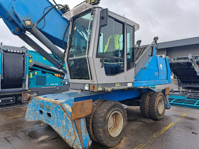 Fuchs MHL 350 - Stroj za rukovanje otpadom: slika Fuchs MHL 350 - Stroj za rukovanje otpadom Fuchs MHL 350 - Stroj za rukovanje otpadom: slika Fuchs MHL 350 - Stroj za rukovanje otpadom