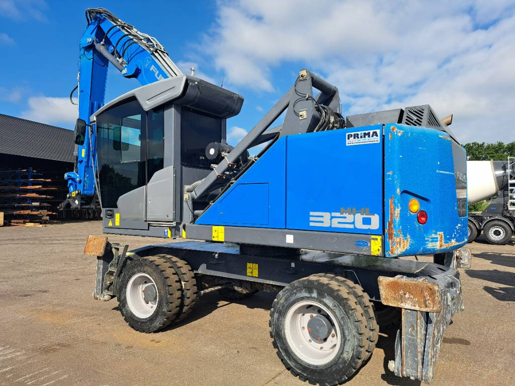 Fuchs MHL320F - Stroj za rukovanje otpadom: slika Fuchs MHL320F - Stroj za rukovanje otpadom Fuchs MHL320F - Stroj za rukovanje otpadom: slika Fuchs MHL320F - Stroj za rukovanje otpadom