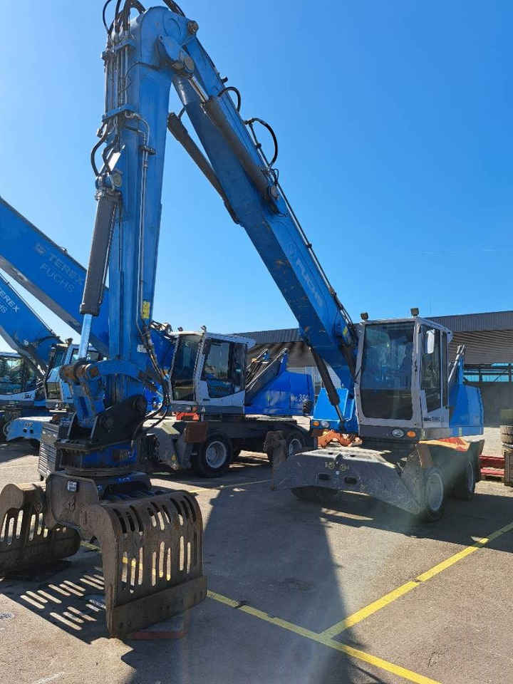 Fuchs MHL331E + Grapple - Stroj za rukovanje otpadom: slika Fuchs MHL331E + Grapple - Stroj za rukovanje otpadom Fuchs MHL331E + Grapple - Stroj za rukovanje otpadom: slika Fuchs MHL331E + Grapple - Stroj za rukovanje otpadom