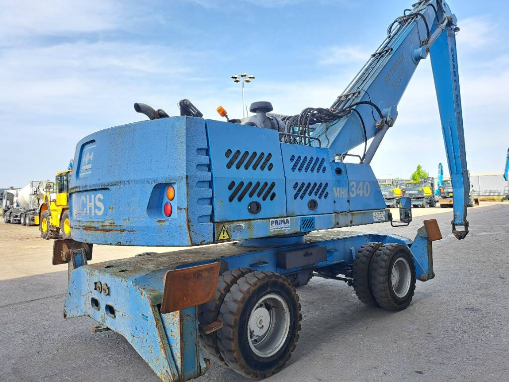 Fuchs MHL340D - Stroj za rukovanje otpadom: slika Fuchs MHL340D - Stroj za rukovanje otpadom Fuchs MHL340D - Stroj za rukovanje otpadom: slika Fuchs MHL340D - Stroj za rukovanje otpadom