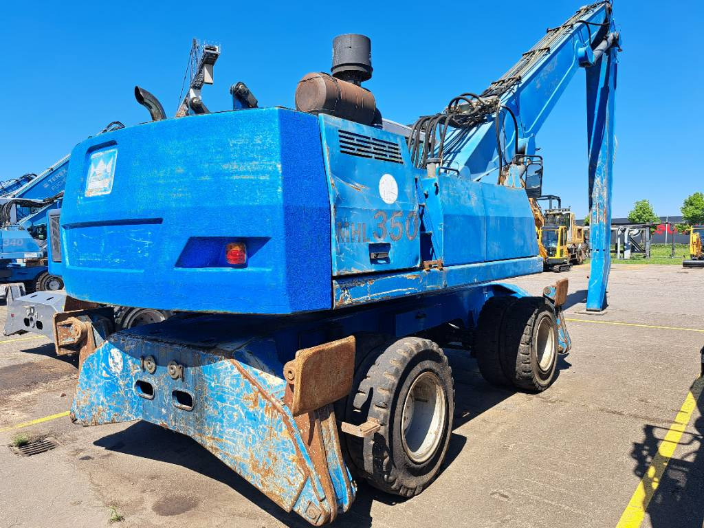 Fuchs MHL350C + generator - Stroj za rukovanje otpadom: slika Fuchs MHL350C + generator - Stroj za rukovanje otpadom Fuchs MHL350C + generator - Stroj za rukovanje otpadom: slika Fuchs MHL350C + generator - Stroj za rukovanje otpadom