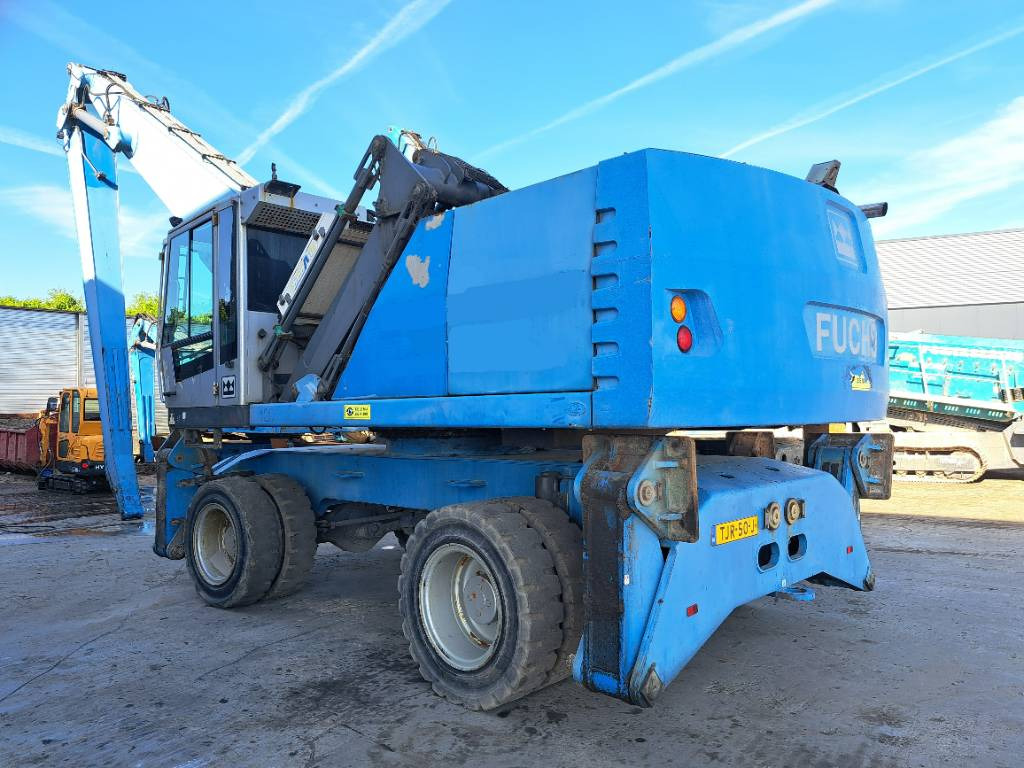 Fuchs MHL360D - Stroj za rukovanje otpadom: slika Fuchs MHL360D - Stroj za rukovanje otpadom Fuchs MHL360D - Stroj za rukovanje otpadom: slika Fuchs MHL360D - Stroj za rukovanje otpadom