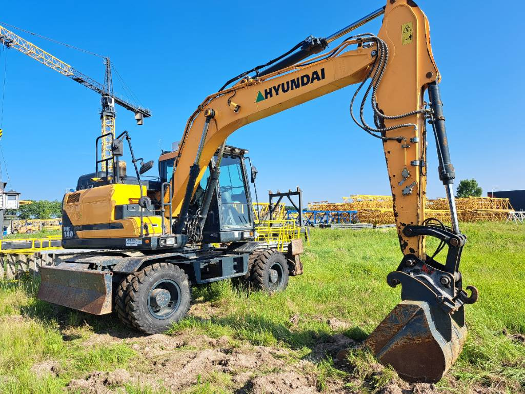 Hyundai HW140 - Bager na kotačima: slika Hyundai HW140 - Bager na kotačima Hyundai HW140 - Bager na kotačima: slika Hyundai HW140 - Bager na kotačima