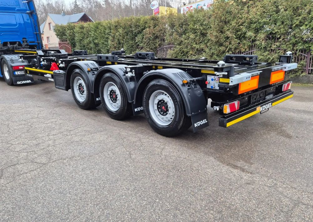 Kögel Podkontenerowa - Transporter kontejnera/ Poluprikolica s izmjenjivim sanducima: slika Kögel Podkontenerowa - Transporter kontejnera/ Poluprikolica s izmjenjivim sanducima Kögel Podkontenerowa - Transporter kontejnera/ Poluprikolica s izmjenjivim sanducima: slika Kögel Podkontenerowa - Transporter kontejnera/ Poluprikolica s izmjenjivim sanducima