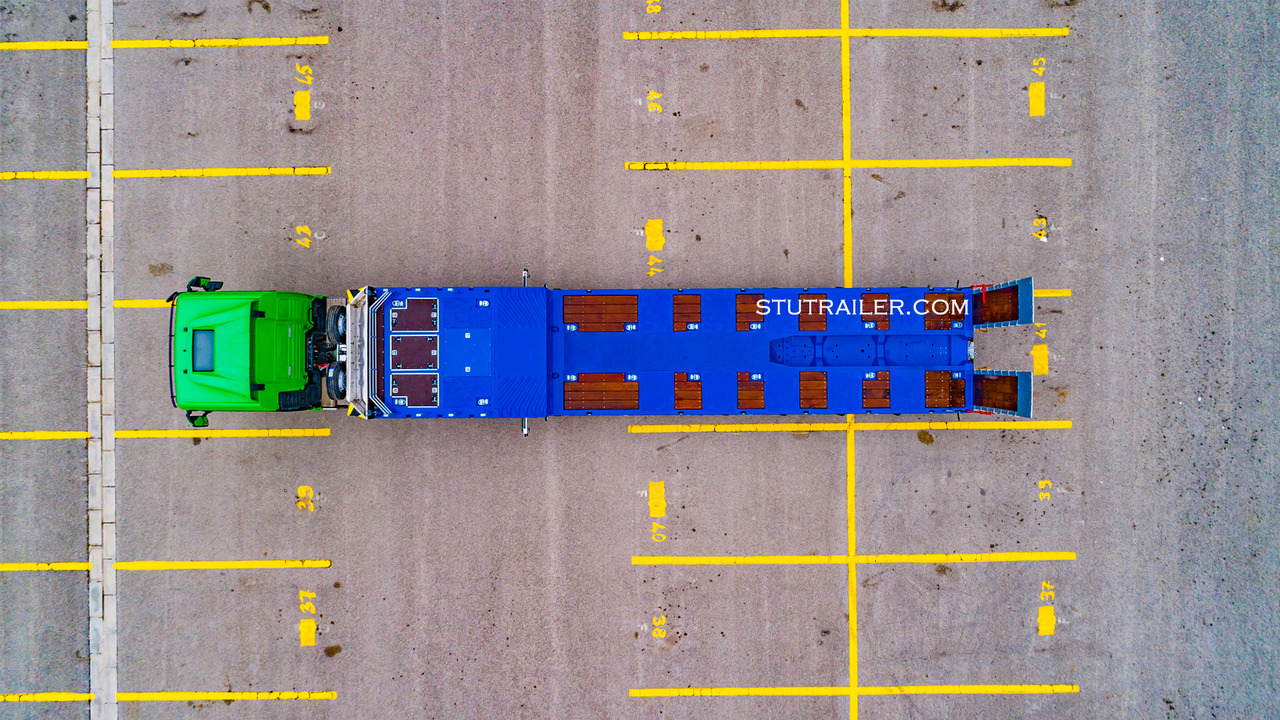 STU 5 Axle Hydraulic Steering Extendable Low Laoder - Poluprikolica s niskim utovarivačem: slika STU 5 Axle Hydraulic Steering Extendable Low Laoder - Poluprikolica s niskim utovarivačem STU 5 Axle Hydraulic Steering Extendable Low Laoder - Poluprikolica s niskim utovarivačem: slika STU 5 Axle Hydraulic Steering Extendable Low Laoder - Poluprikolica s niskim utovarivačem