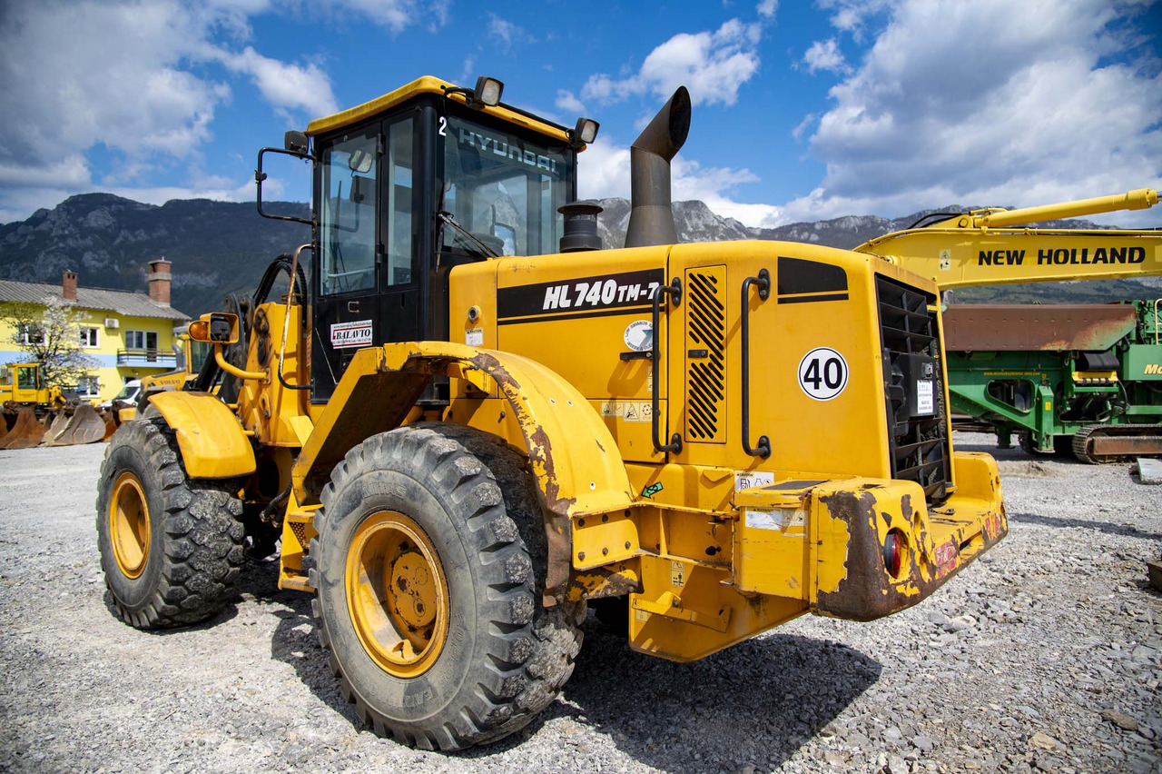 Hyundai HL740TM-7 - Utovarivač na kotačima: slika Hyundai HL740TM-7 - Utovarivač na kotačima Hyundai HL740TM-7 - Utovarivač na kotačima: slika Hyundai HL740TM-7 - Utovarivač na kotačima