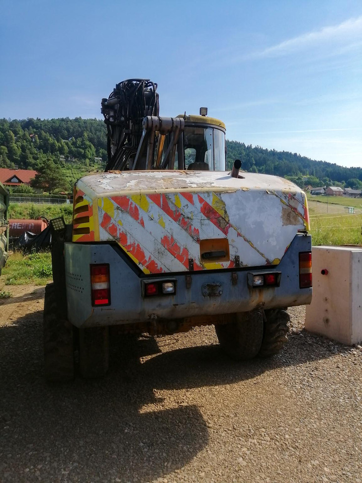 MECALAC 14 MXT - Bager na kotačima: slika MECALAC 14 MXT - Bager na kotačima MECALAC 14 MXT - Bager na kotačima: slika MECALAC 14 MXT - Bager na kotačima