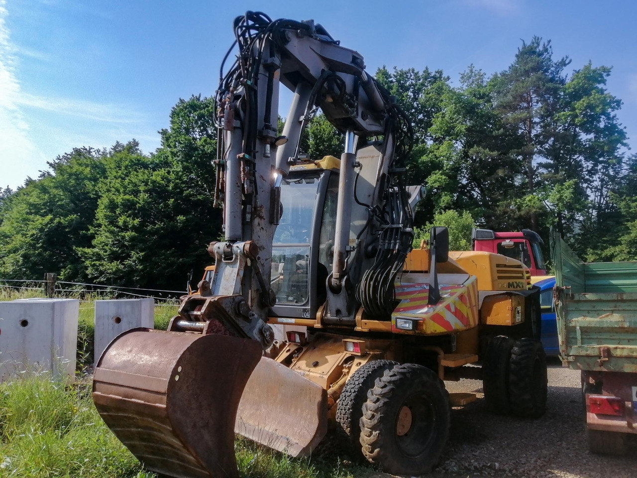 MECALAC 14 MXT - Bager na kotačima: slika MECALAC 14 MXT - Bager na kotačima MECALAC 14 MXT - Bager na kotačima: slika MECALAC 14 MXT - Bager na kotačima