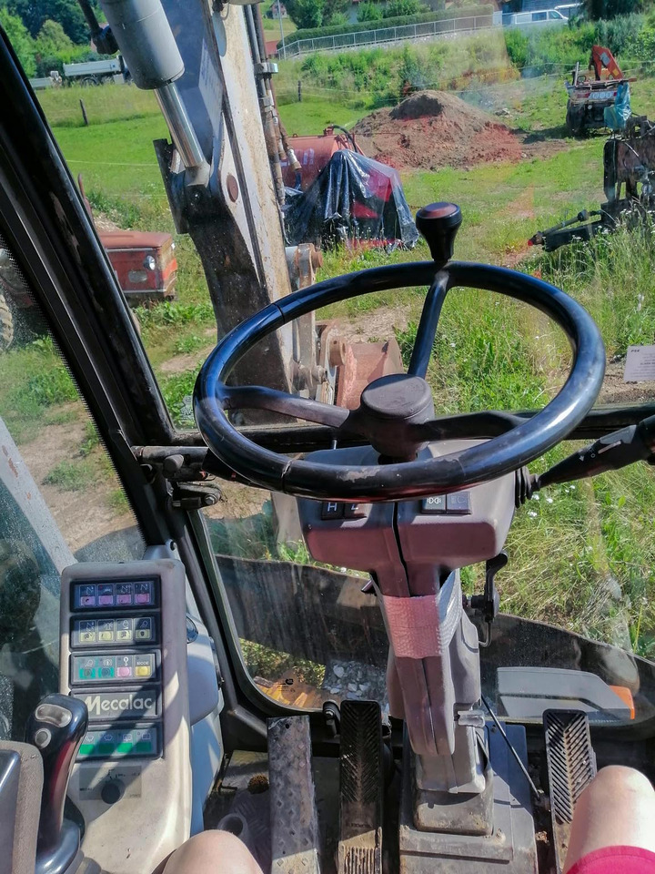 MECALAC 14 MXT - Bager na kotačima: slika MECALAC 14 MXT - Bager na kotačima MECALAC 14 MXT - Bager na kotačima: slika MECALAC 14 MXT - Bager na kotačima