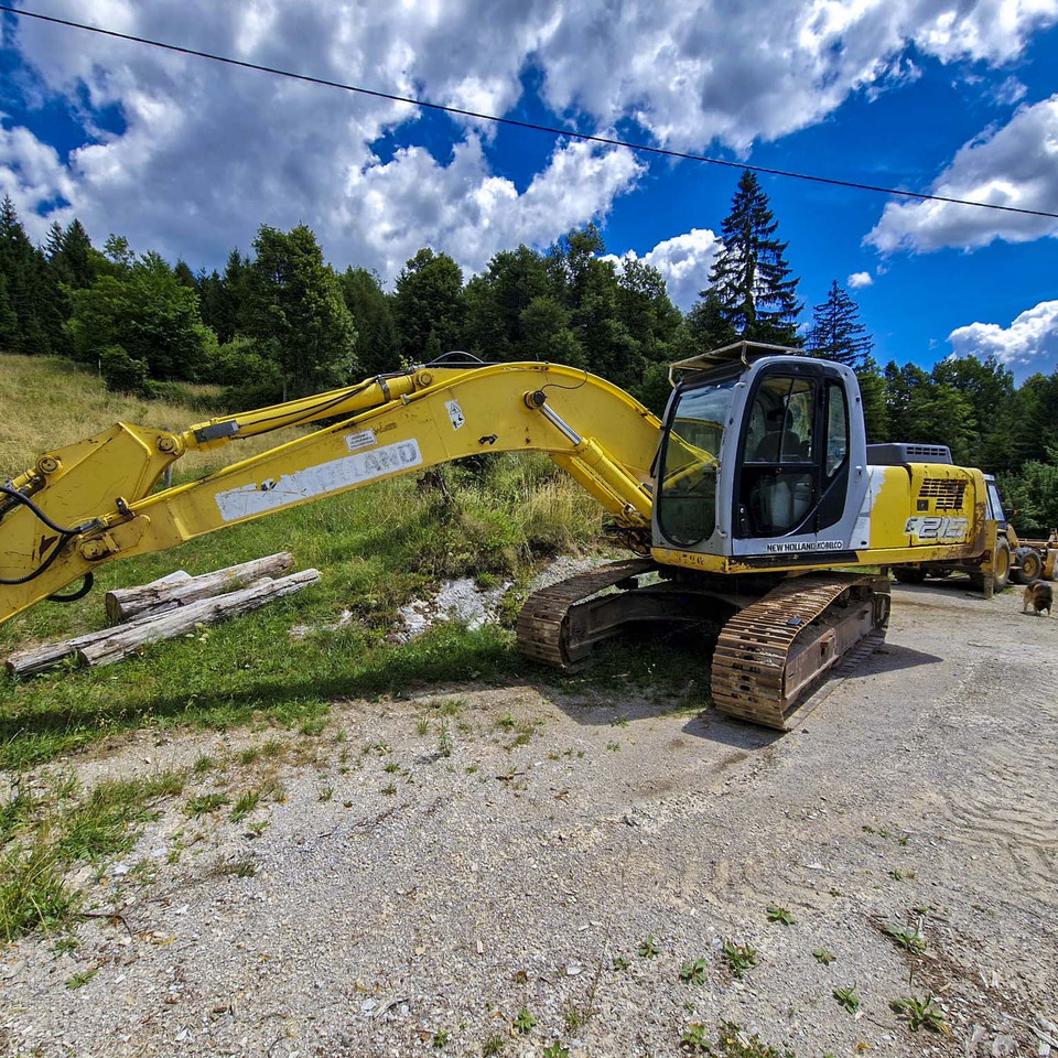 New Holland Kobelco E215 - Bager gusjeničar: slika New Holland Kobelco E215 - Bager gusjeničar New Holland Kobelco E215 - Bager gusjeničar: slika New Holland Kobelco E215 - Bager gusjeničar