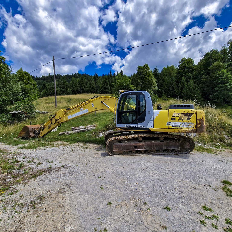 New Holland Kobelco E215 - Bager gusjeničar: slika New Holland Kobelco E215 - Bager gusjeničar New Holland Kobelco E215 - Bager gusjeničar: slika New Holland Kobelco E215 - Bager gusjeničar
