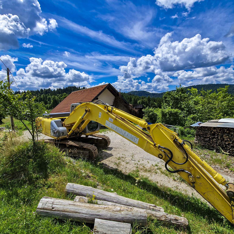 New Holland Kobelco E215 - Bager gusjeničar: slika New Holland Kobelco E215 - Bager gusjeničar New Holland Kobelco E215 - Bager gusjeničar: slika New Holland Kobelco E215 - Bager gusjeničar