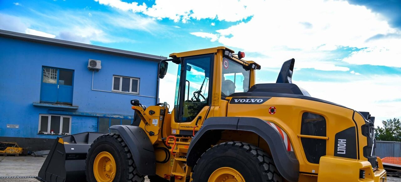 Volvo L110H - Utovarivač na kotačima: slika Volvo L110H - Utovarivač na kotačima Volvo L110H - Utovarivač na kotačima: slika Volvo L110H - Utovarivač na kotačima