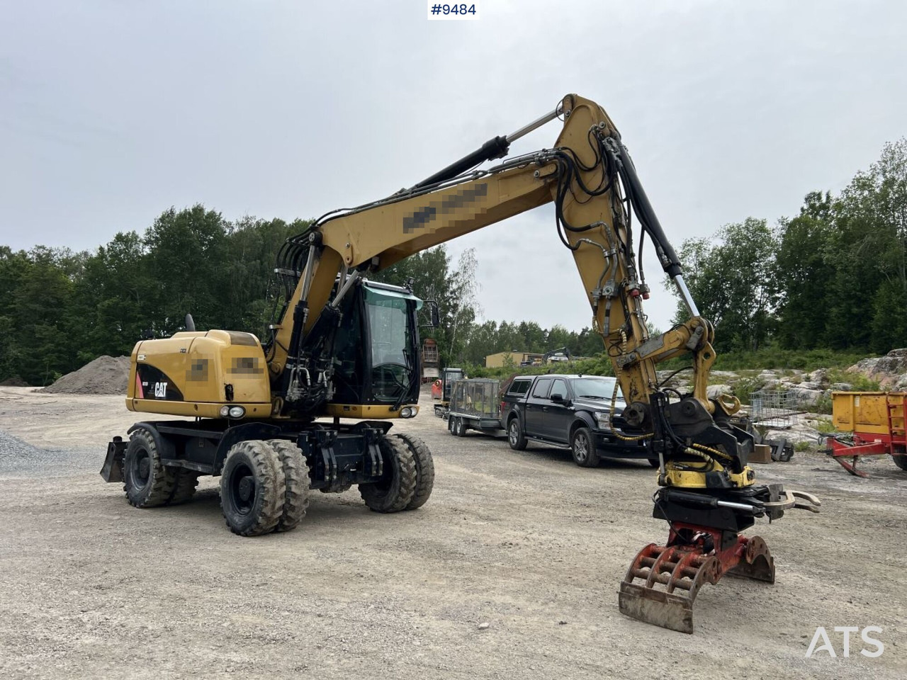CAT M313D with tipping wagon and attachments (VIDEO) - Bager na kotačima: slika CAT M313D with tipping wagon and attachments (VIDEO) - Bager na kotačima CAT M313D with tipping wagon and attachments (VIDEO) - Bager na kotačima: slika CAT M313D with tipping wagon and attachments (VIDEO) - Bager na kotačima
