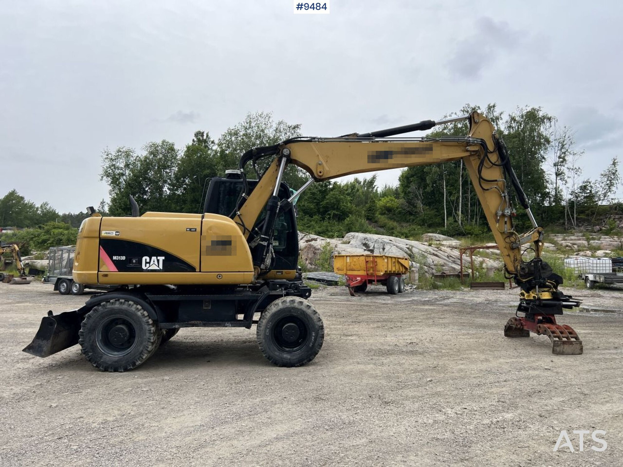 CAT M313D with tipping wagon and attachments (VIDEO) - Bager na kotačima: slika CAT M313D with tipping wagon and attachments (VIDEO) - Bager na kotačima CAT M313D with tipping wagon and attachments (VIDEO) - Bager na kotačima: slika CAT M313D with tipping wagon and attachments (VIDEO) - Bager na kotačima