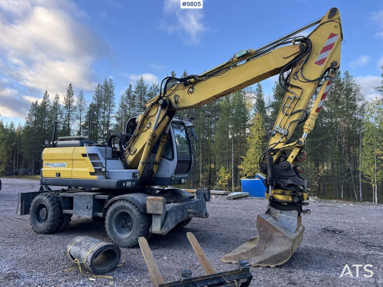 New Holland, MH-Plus-C Wheel excavator with excavation system, rotor, and grader bucket - Bager na kotačima: slika  New Holland, MH-Plus-C Wheel excavator with excavation system, rotor, and grader bucket - Bager na kotačima New Holland, MH-Plus-C Wheel excavator with excavation system, rotor, and grader bucket - Bager na kotačima: slika  New Holland, MH-Plus-C Wheel excavator with excavation system, rotor, and grader bucket - Bager na kotačima