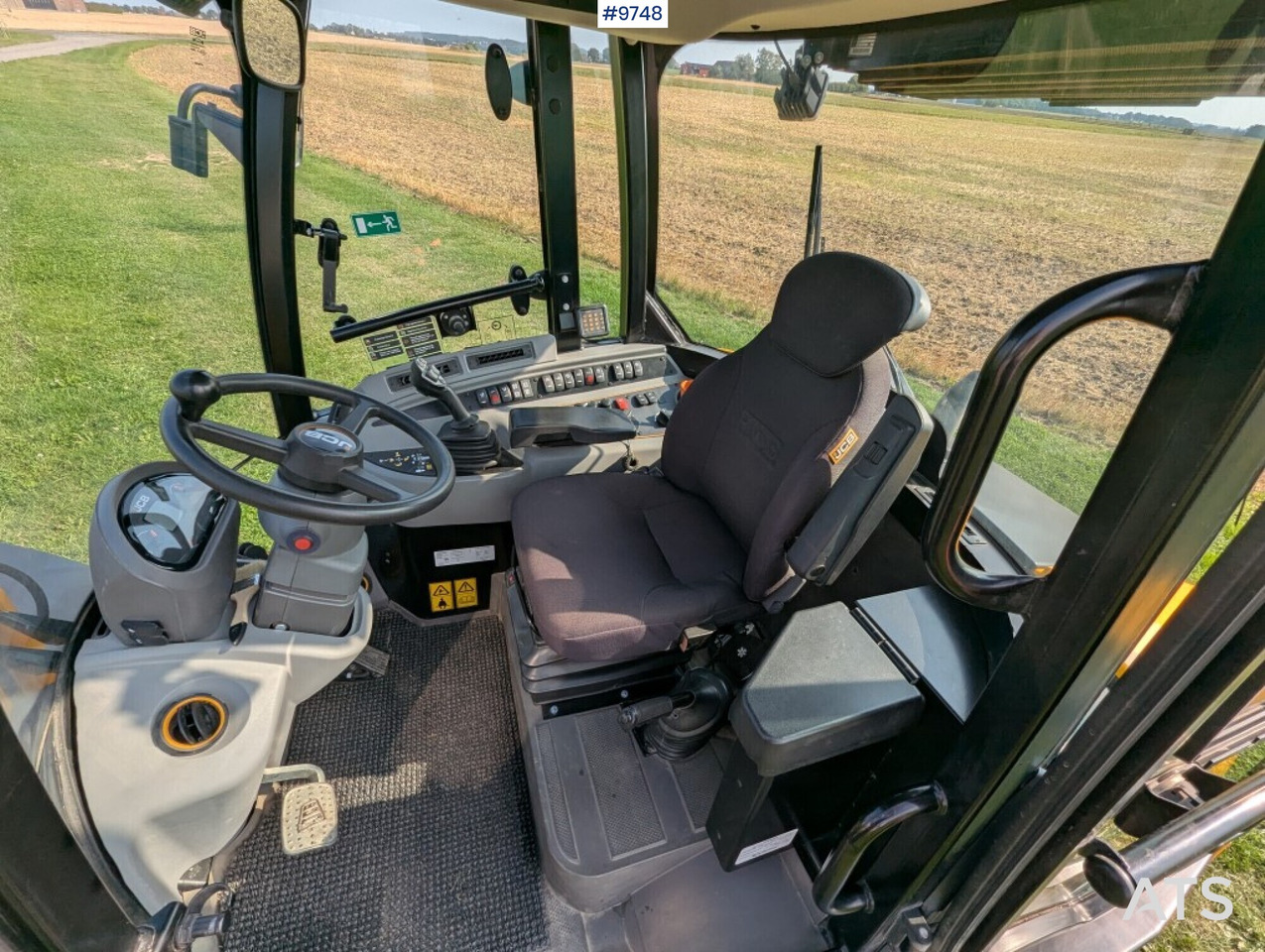 Wheel loader JCB 409 Stage V Nordic Edition 40km/h with attachments - Utovarivač na kotačima: slika Wheel loader JCB 409 Stage V Nordic Edition 40km/h with attachments - Utovarivač na kotačima Wheel loader JCB 409 Stage V Nordic Edition 40km/h with attachments - Utovarivač na kotačima: slika Wheel loader JCB 409 Stage V Nordic Edition 40km/h with attachments - Utovarivač na kotačima