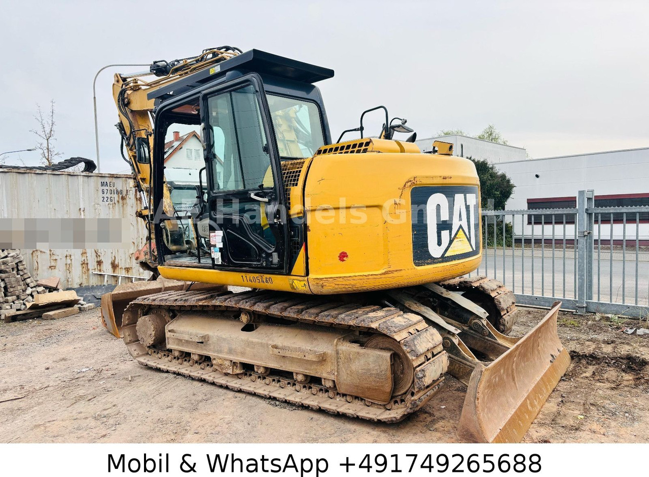 CAT 311D *6600Std./Schnellwechsler/Schaufel/Klima - Bager gusjeničar: slika CAT 311D *6600Std./Schnellwechsler/Schaufel/Klima - Bager gusjeničar CAT 311D *6600Std./Schnellwechsler/Schaufel/Klima - Bager gusjeničar: slika CAT 311D *6600Std./Schnellwechsler/Schaufel/Klima - Bager gusjeničar