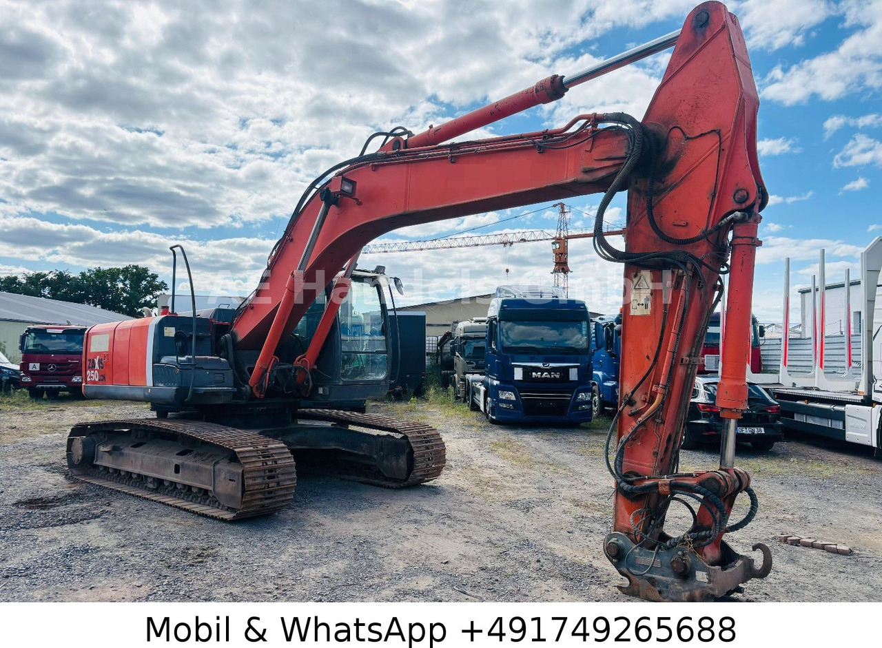 Hitachi ZX250LCN-3 *16.800 STD/Monoausleger/OilQuick - Bager gusjeničar: slika Hitachi ZX250LCN-3 *16.800 STD/Monoausleger/OilQuick - Bager gusjeničar Hitachi ZX250LCN-3 *16.800 STD/Monoausleger/OilQuick - Bager gusjeničar: slika Hitachi ZX250LCN-3 *16.800 STD/Monoausleger/OilQuick - Bager gusjeničar