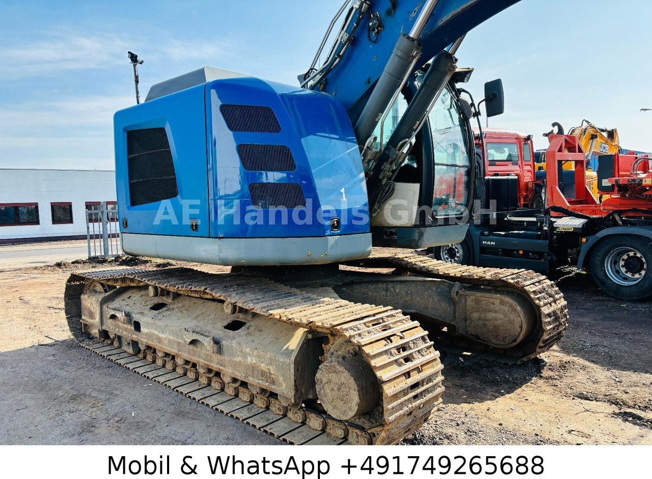 Liebherr R926 Compact *Oilquick/Verstellausleger - Bager gusjeničar: slika Liebherr R926 Compact *Oilquick/Verstellausleger - Bager gusjeničar Liebherr R926 Compact *Oilquick/Verstellausleger - Bager gusjeničar: slika Liebherr R926 Compact *Oilquick/Verstellausleger - Bager gusjeničar