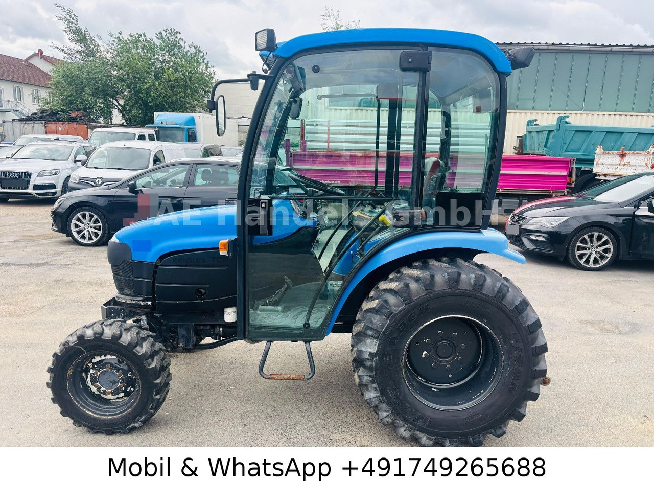 New Holland TC22D Compact Tractor *1500Std./StraßenZulassung - Traktor: slika  New Holland TC22D Compact Tractor *1500Std./StraßenZulassung - Traktor New Holland TC22D Compact Tractor *1500Std./StraßenZulassung - Traktor: slika  New Holland TC22D Compact Tractor *1500Std./StraßenZulassung - Traktor