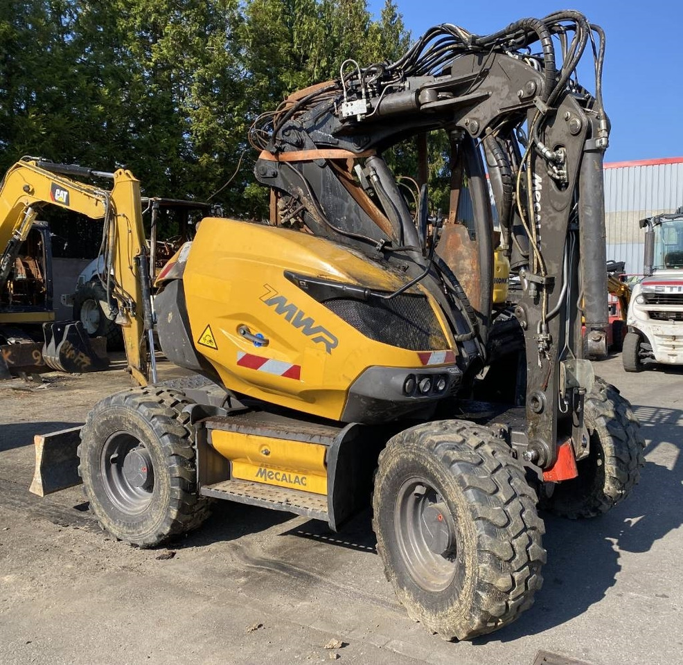 Mecalac 7 MWR Origine Française endommagée - Bager na kotačima: slika Mecalac 7 MWR Origine Française endommagée - Bager na kotačima Mecalac 7 MWR Origine Française endommagée - Bager na kotačima: slika Mecalac 7 MWR Origine Française endommagée - Bager na kotačima