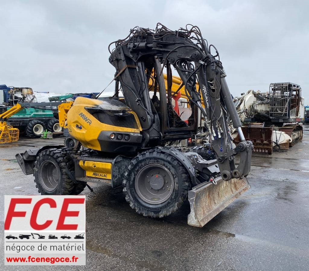 Mecalac 9 MWR / 1er Main Origine Française endommagée - Bager na kotačima: slika Mecalac 9 MWR / 1er Main Origine Française endommagée - Bager na kotačima Mecalac 9 MWR / 1er Main Origine Française endommagée - Bager na kotačima: slika Mecalac 9 MWR / 1er Main Origine Française endommagée - Bager na kotačima