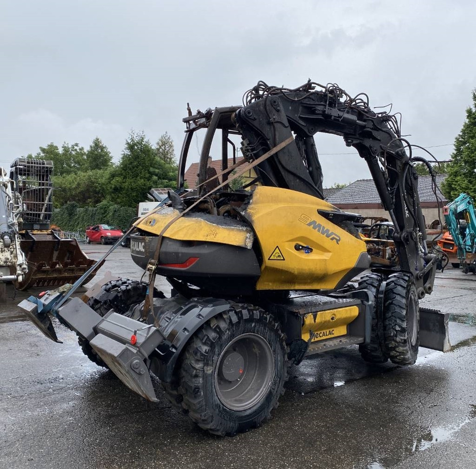 Mecalac 9 MWR / 1er Main Origine Française endommagée - Bager na kotačima: slika Mecalac 9 MWR / 1er Main Origine Française endommagée - Bager na kotačima Mecalac 9 MWR / 1er Main Origine Française endommagée - Bager na kotačima: slika Mecalac 9 MWR / 1er Main Origine Française endommagée - Bager na kotačima