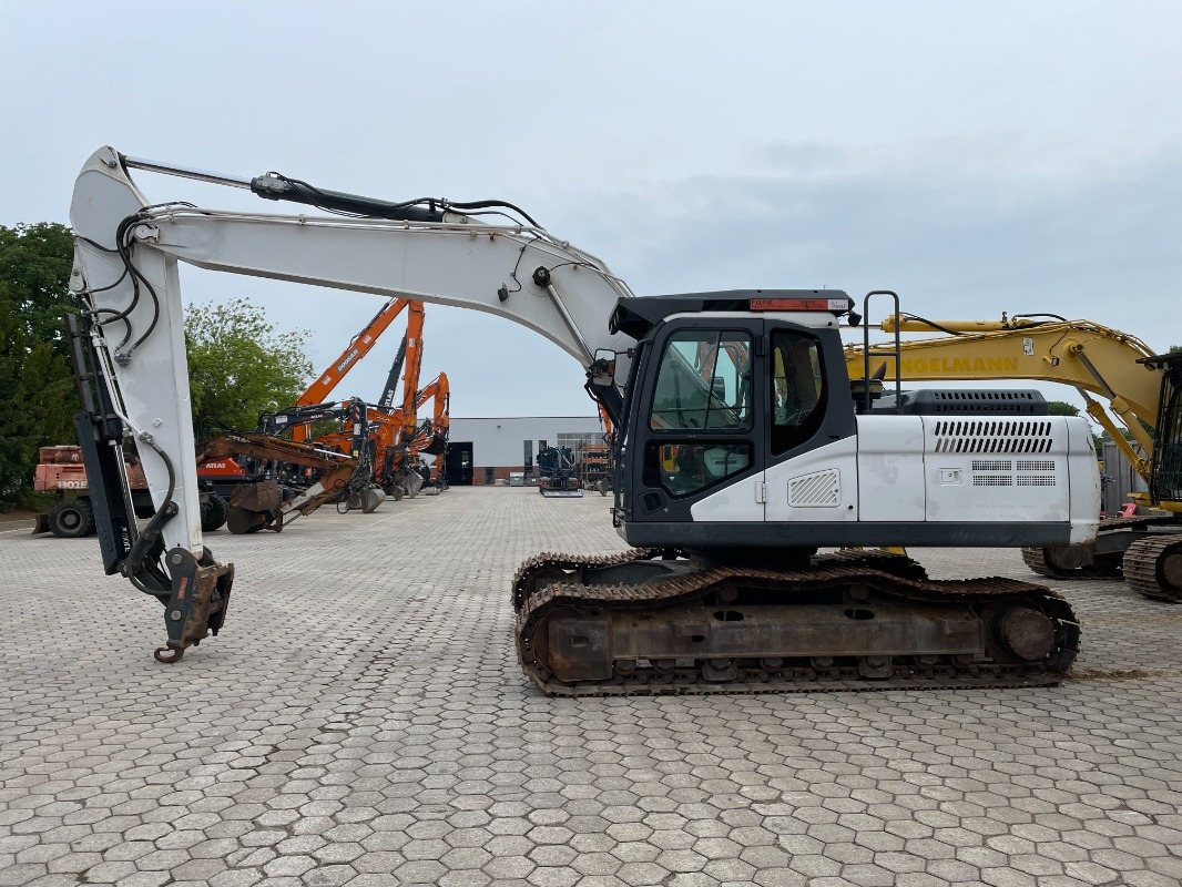 Doosan DX225LC-5 - Bager gusjeničar: slika Doosan DX225LC-5 - Bager gusjeničar Doosan DX225LC-5 - Bager gusjeničar: slika Doosan DX225LC-5 - Bager gusjeničar