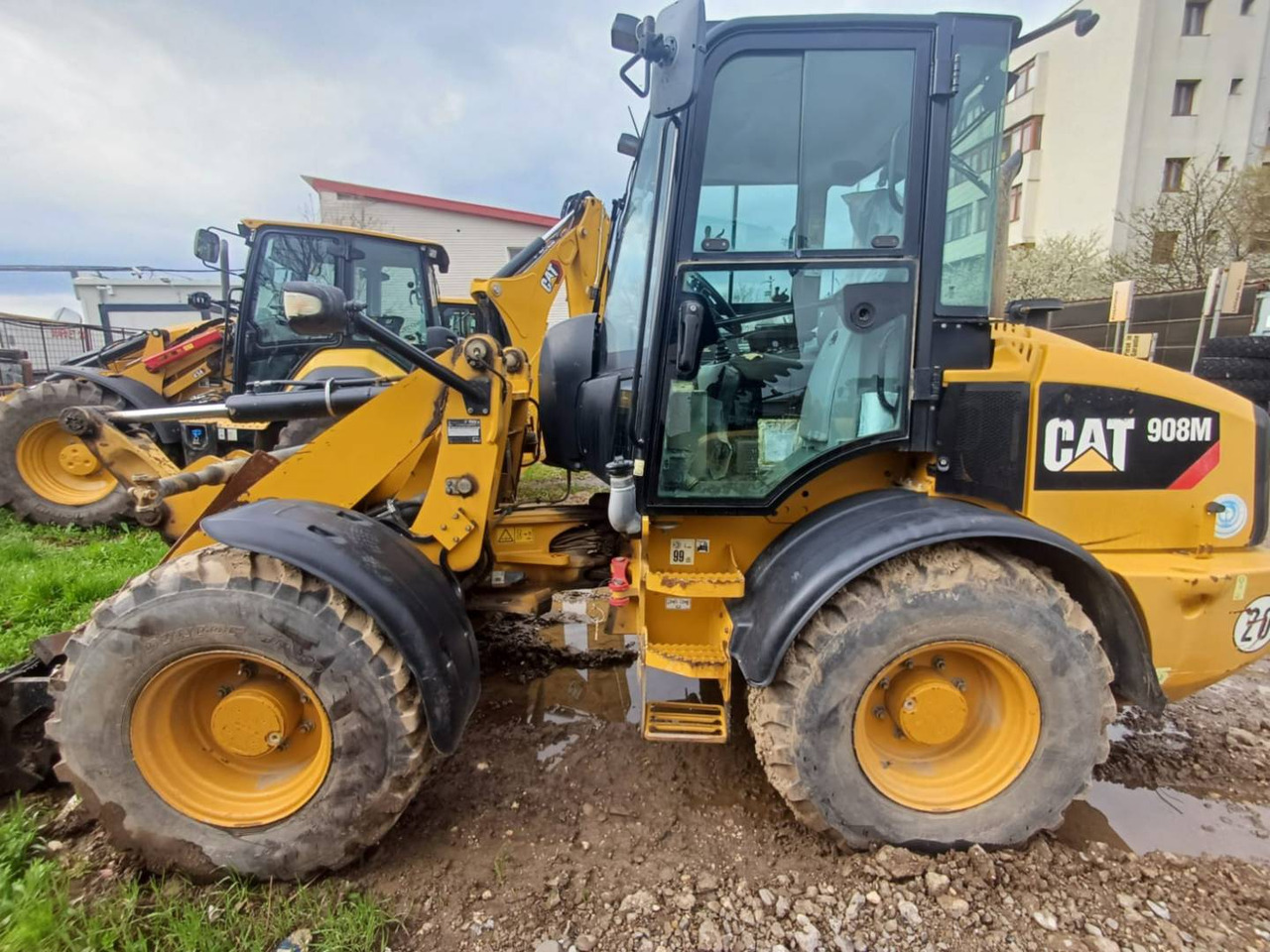 CAT 908M - Utovarivač na kotačima: slika CAT 908M - Utovarivač na kotačima CAT 908M - Utovarivač na kotačima: slika CAT 908M - Utovarivač na kotačima