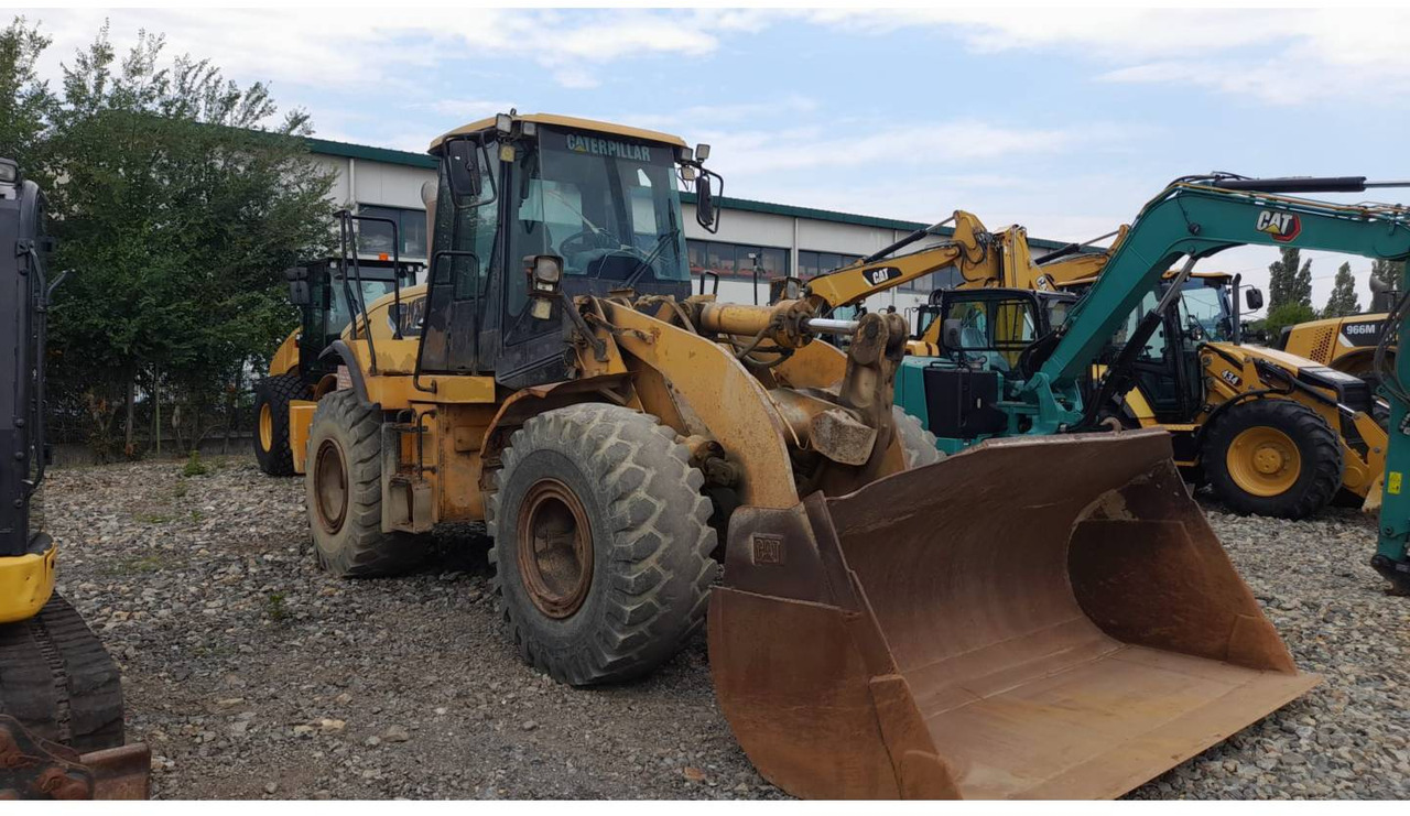 CAT 950H - Utovarivač na kotačima: slika CAT 950H - Utovarivač na kotačima CAT 950H - Utovarivač na kotačima: slika CAT 950H - Utovarivač na kotačima