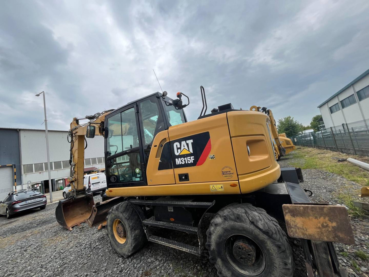CAT M315F - Bager na kotačima: slika CAT M315F - Bager na kotačima CAT M315F - Bager na kotačima: slika CAT M315F - Bager na kotačima
