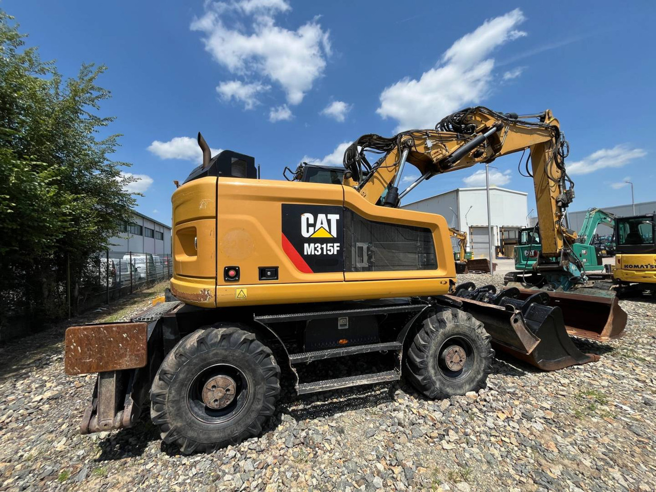 CAT M315F - Bager na kotačima: slika CAT M315F - Bager na kotačima CAT M315F - Bager na kotačima: slika CAT M315F - Bager na kotačima