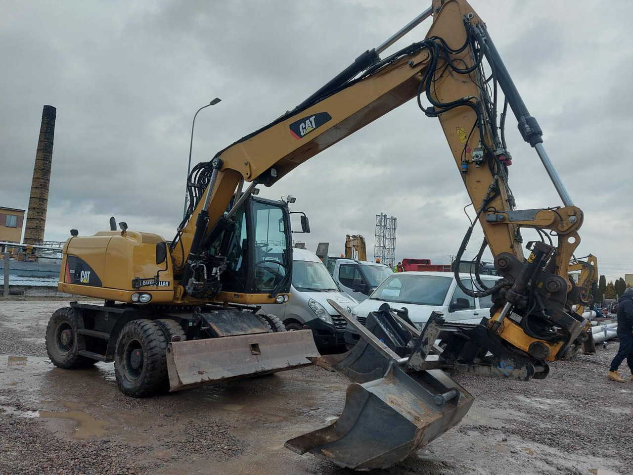 CAT M313D - Bager na kotačima: slika CAT M313D - Bager na kotačima CAT M313D - Bager na kotačima: slika CAT M313D - Bager na kotačima