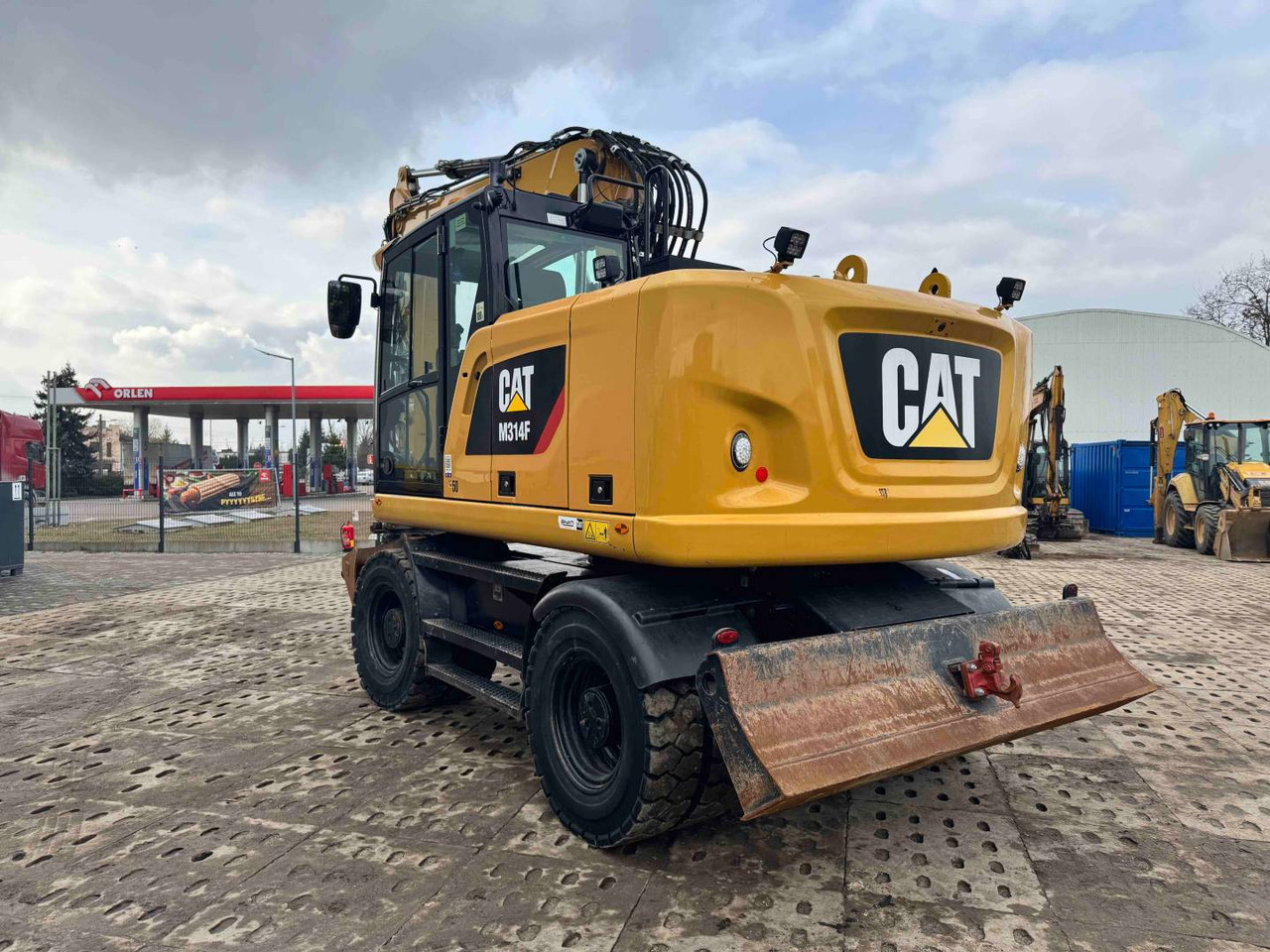 CAT M314F - Bager na kotačima: slika CAT M314F - Bager na kotačima CAT M314F - Bager na kotačima: slika CAT M314F - Bager na kotačima