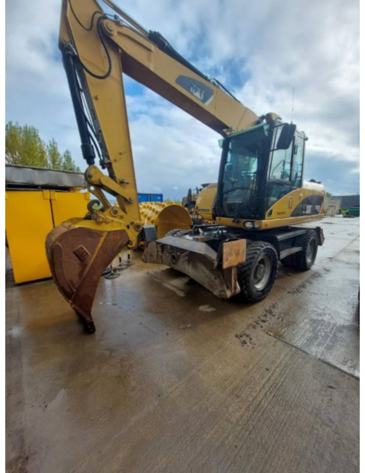 CAT M315D - Bager na kotačima: slika CAT M315D - Bager na kotačima CAT M315D - Bager na kotačima: slika CAT M315D - Bager na kotačima