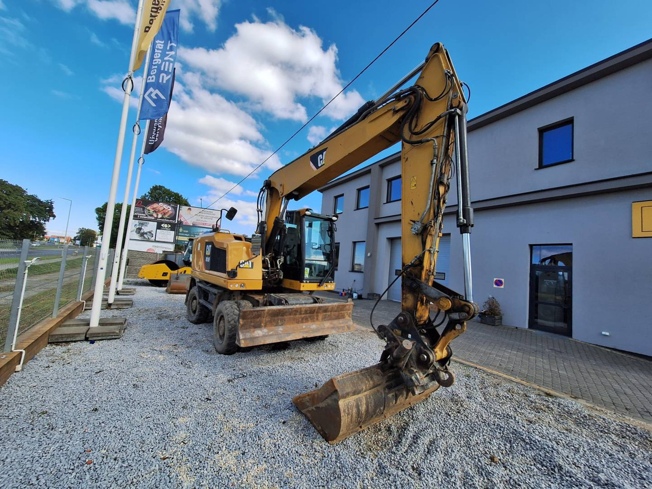 CAT M318F - Bager na kotačima: slika CAT M318F - Bager na kotačima CAT M318F - Bager na kotačima: slika CAT M318F - Bager na kotačima