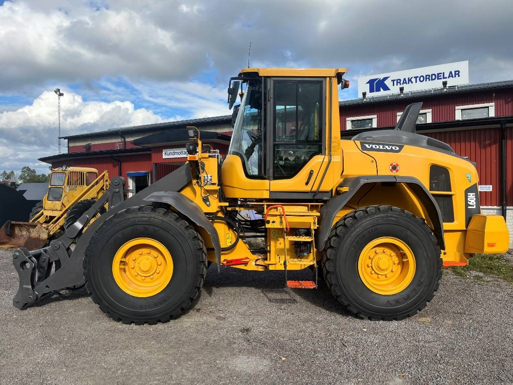 Volvo L 60 H - Utovarivač na kotačima: slika Volvo L 60 H - Utovarivač na kotačima Volvo L 60 H - Utovarivač na kotačima: slika Volvo L 60 H - Utovarivač na kotačima