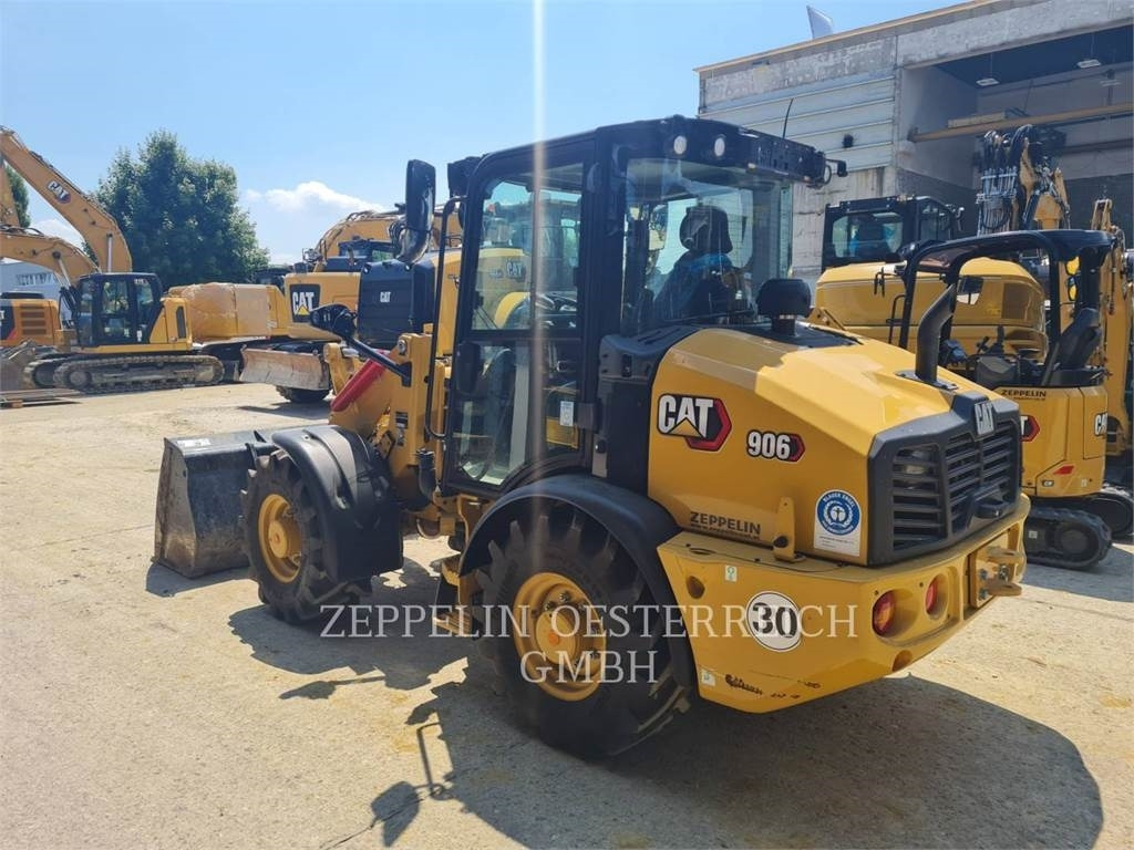 CAT 906-14 - Utovarivač na kotačima: slika CAT 906-14 - Utovarivač na kotačima CAT 906-14 - Utovarivač na kotačima: slika CAT 906-14 - Utovarivač na kotačima