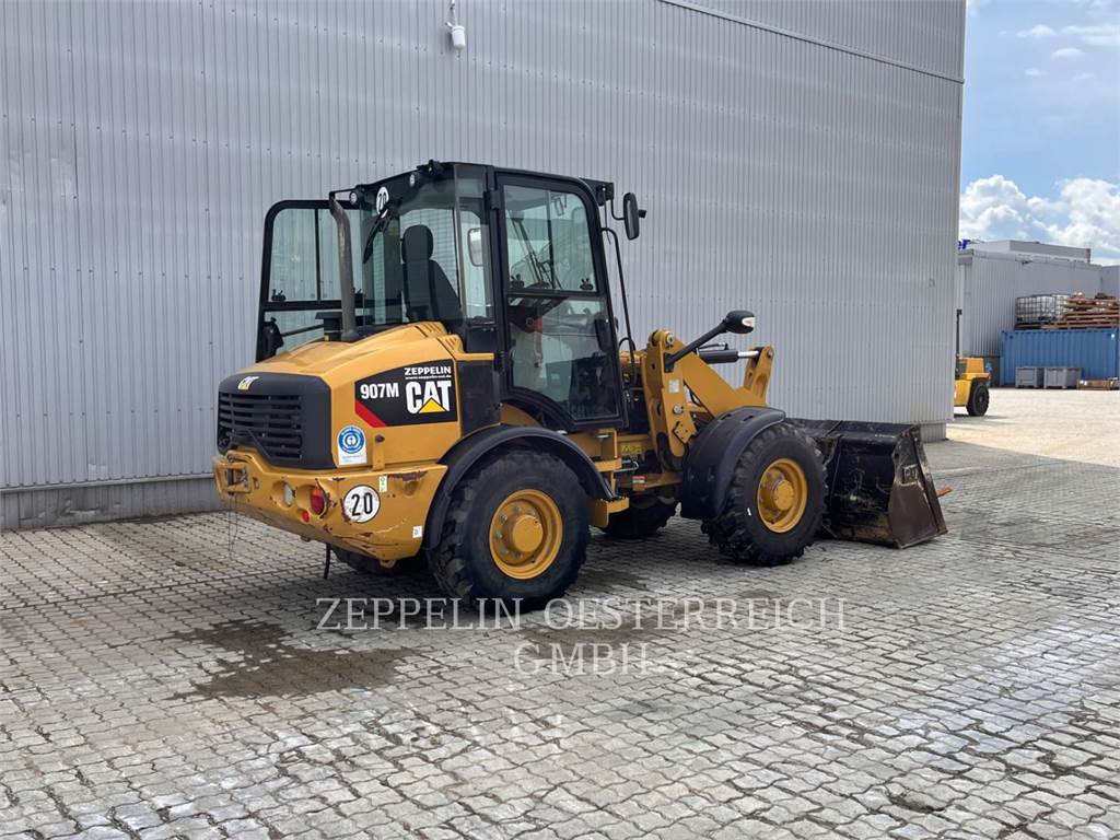CAT 907M - Utovarivač na kotačima: slika CAT 907M - Utovarivač na kotačima CAT 907M - Utovarivač na kotačima: slika CAT 907M - Utovarivač na kotačima