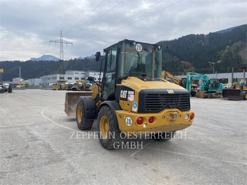 CAT 908M - Utovarivač na kotačima: slika  CAT 908M - Utovarivač na kotačima CAT 908M - Utovarivač na kotačima: slika  CAT 908M - Utovarivač na kotačima
