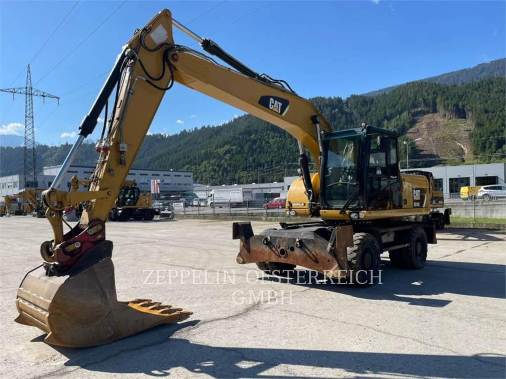 CAT M316D - Bager na kotačima: slika CAT M316D - Bager na kotačima CAT M316D - Bager na kotačima: slika CAT M316D - Bager na kotačima
