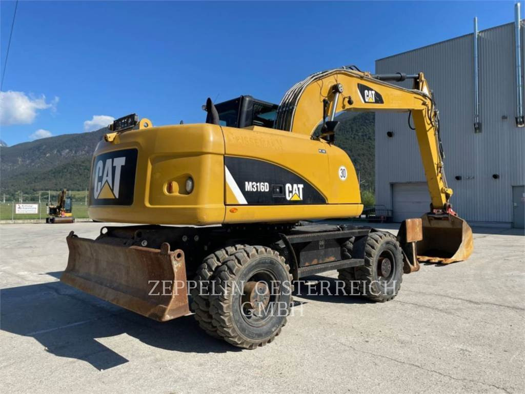 CAT M316D - Bager na kotačima: slika CAT M316D - Bager na kotačima CAT M316D - Bager na kotačima: slika CAT M316D - Bager na kotačima