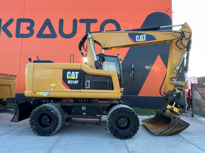 Caterpillar M 318 F ROTOTILT / CENTRAL LUBRICATION / AC - Bager na kotačima: slika Caterpillar M 318 F ROTOTILT / CENTRAL LUBRICATION / AC - Bager na kotačima Caterpillar M 318 F ROTOTILT / CENTRAL LUBRICATION / AC - Bager na kotačima: slika Caterpillar M 318 F ROTOTILT / CENTRAL LUBRICATION / AC - Bager na kotačima